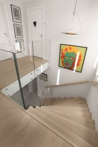 Boltet glassrekkverk uten håndløper, designtrapp med underliggende vange Boltet glassrekkverk uten håndløper, designtrapp med underliggende vange